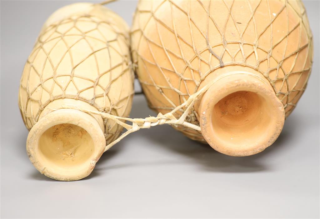 A pair of Moroccan strapped clay drums (Tbila)